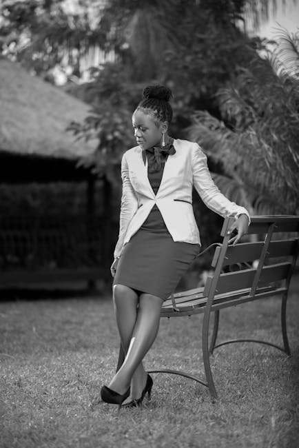 A vibrant field of purple nemophila flowers under a clear blue sky at Ashikaga Flower Park