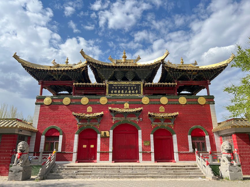 A gardener meticulously tending to moss in a temple garden